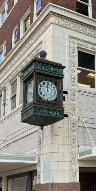 This picture shows a Century old clock located in the city of San Antonio on the corner of the rand building